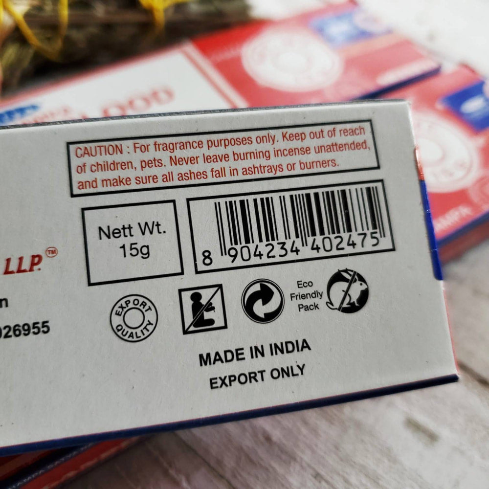 15g box of Satya brand Dragon’s Blood incense sticks on a table for crystal cleansing