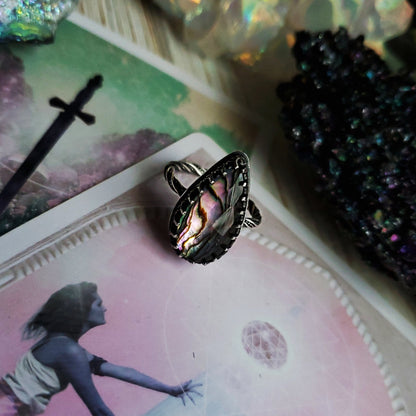 a ring with a picture of a woman on it